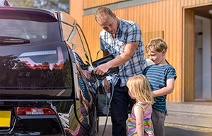 Family with electric vehicle